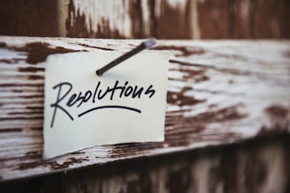Sticky note with "Resolutions" text, symbolizing dispute resolution services for insurance claims