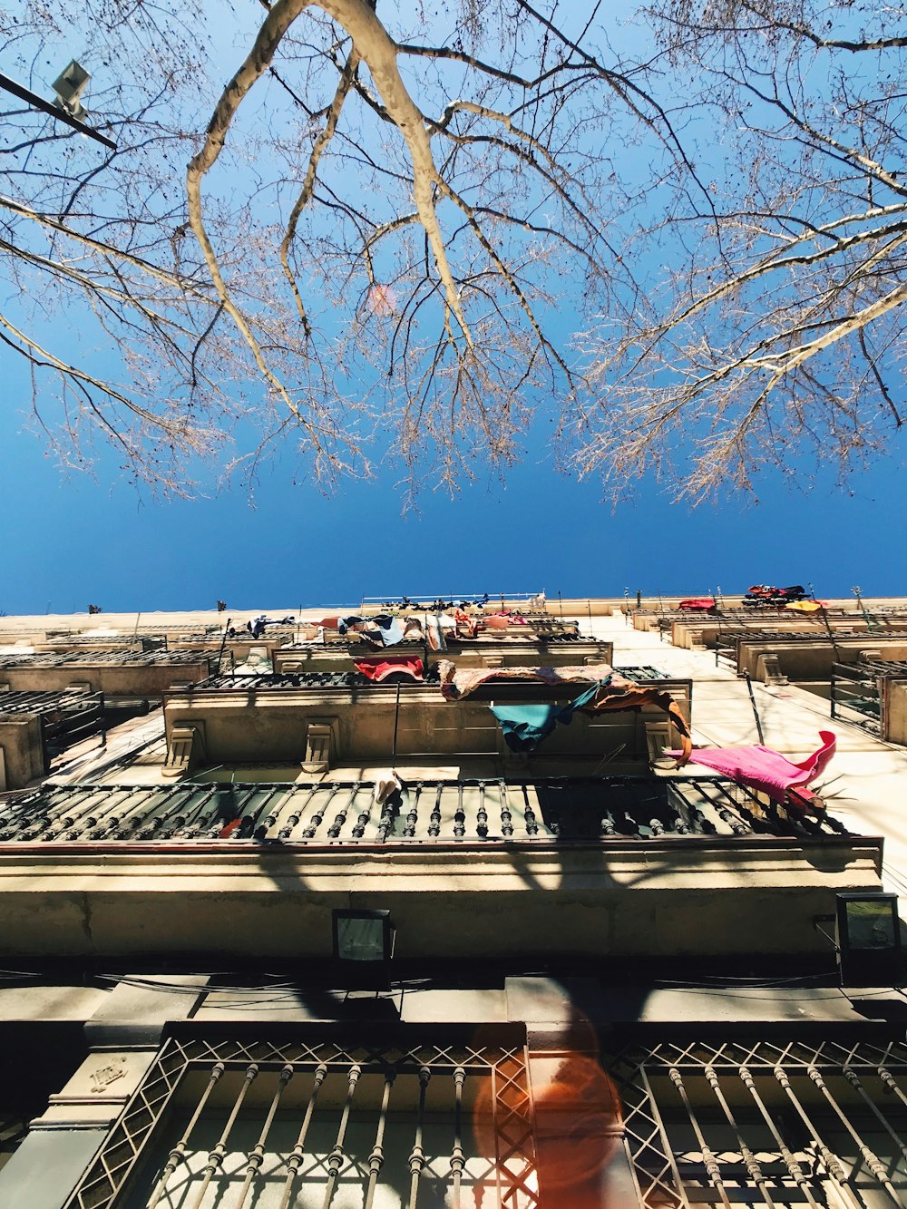 white and brown concrete building under blue sky during daytime