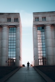 people walking near brown concrete building during daytime