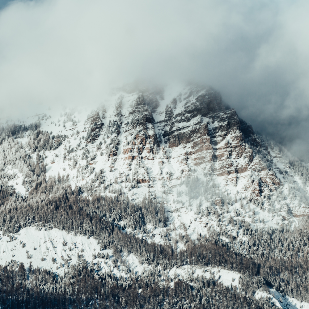 snow covered mountain during daytime