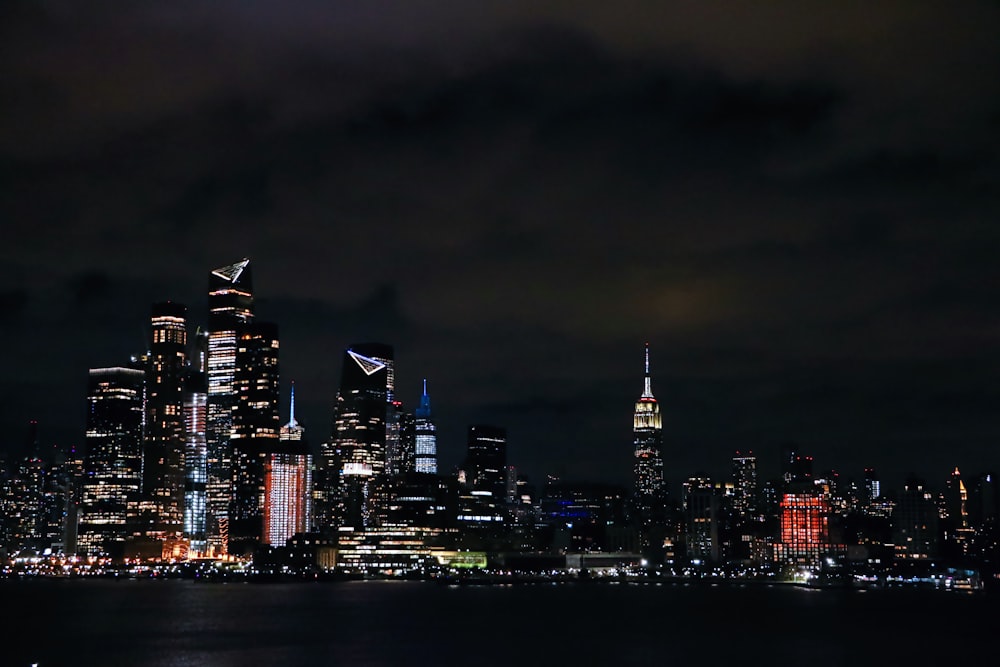 city skyline during night time