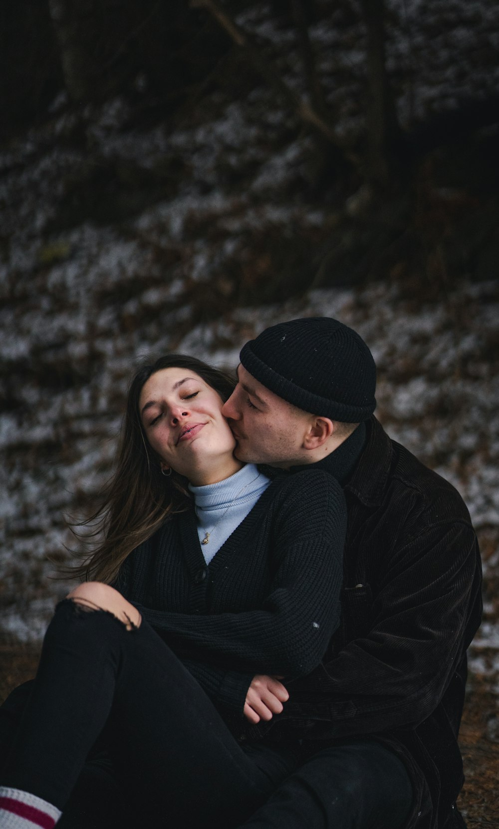 man in black knit cap and black jacket