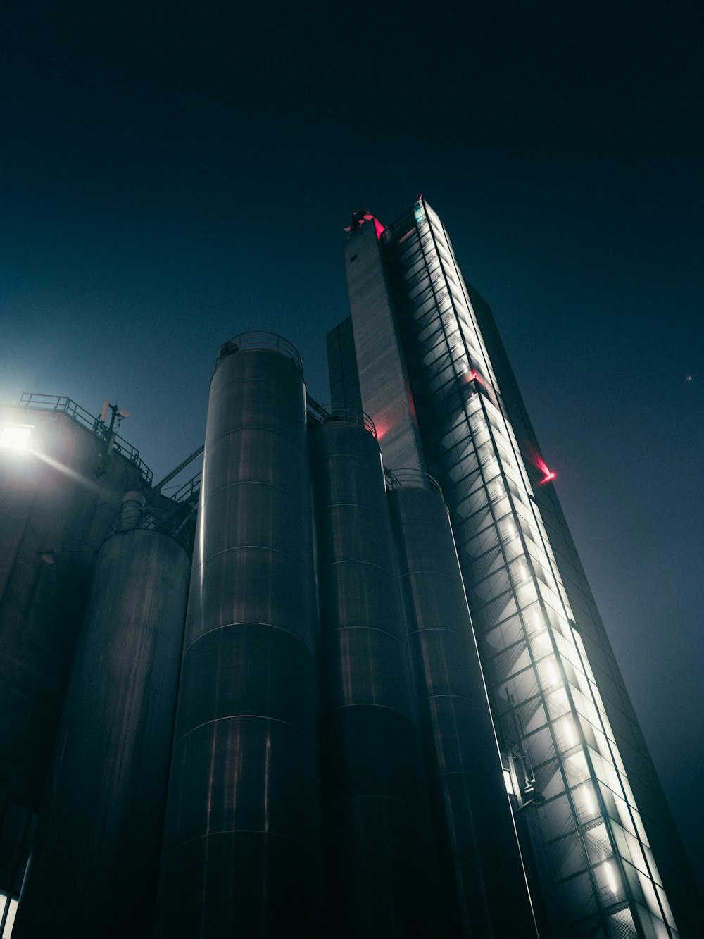 gray concrete building during night time