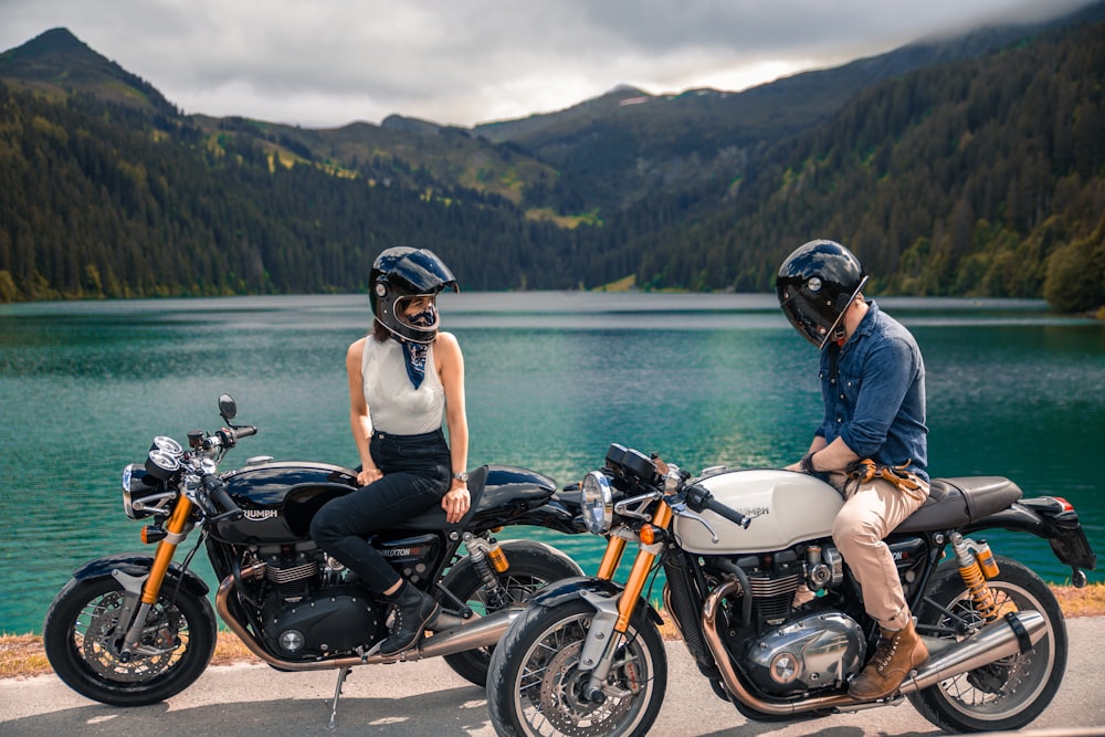 woman in black helmet riding on black motorcycle during daytime