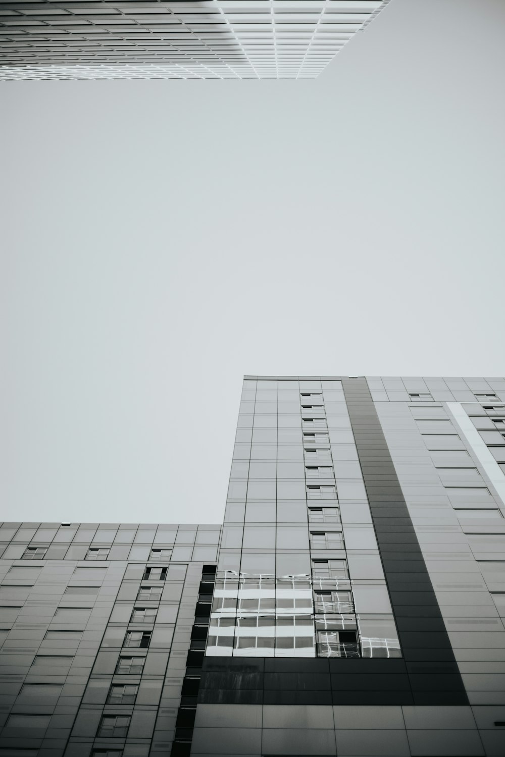 grayscale photo of high rise building