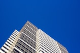 A completed building with a clear blue sky backdrop.