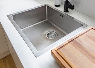 stainless steel sink with faucet