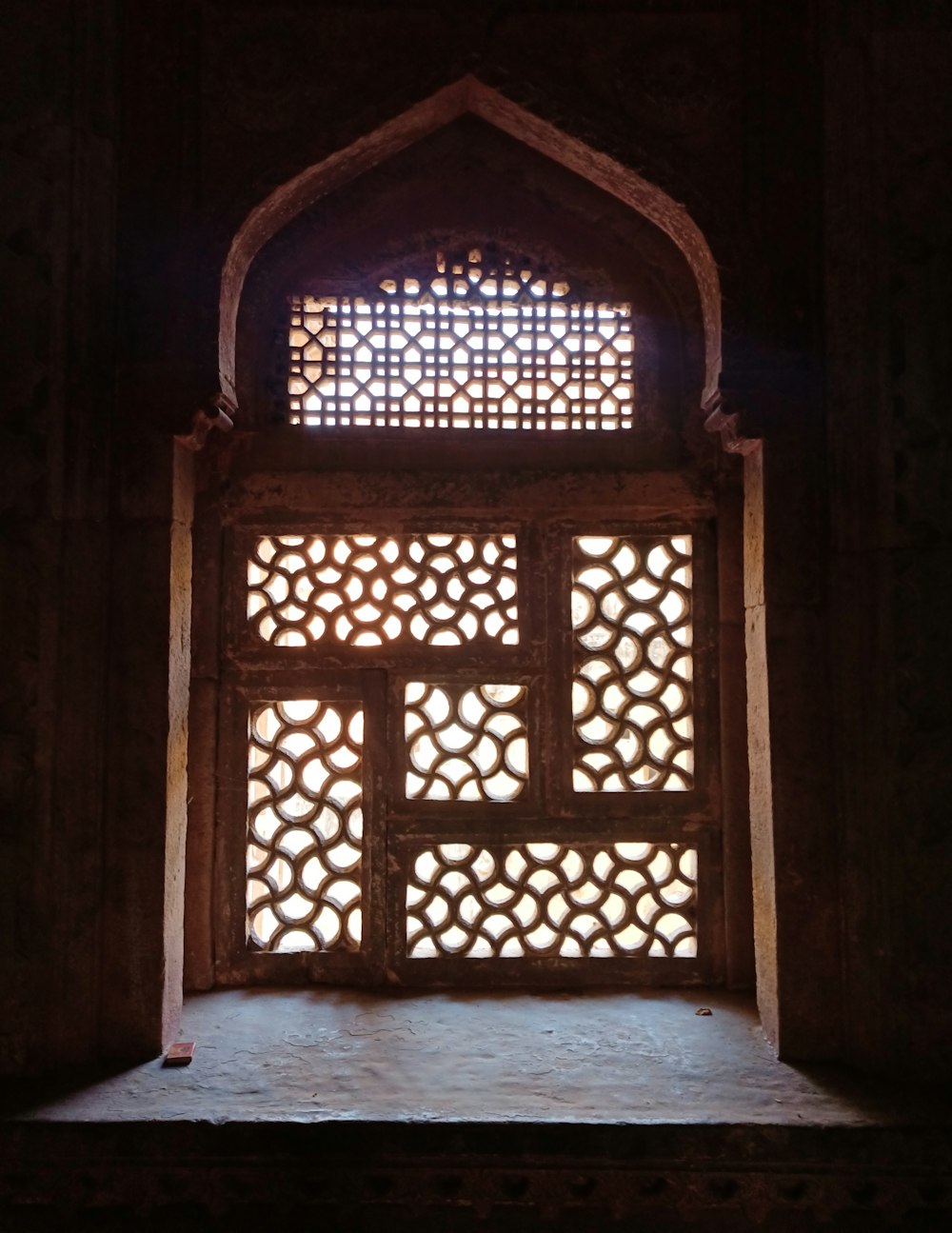 brown wooden framed glass window