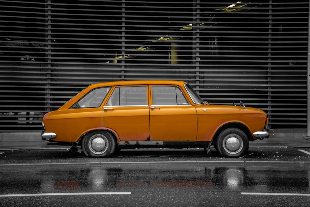 yellow car parked on the side of the road