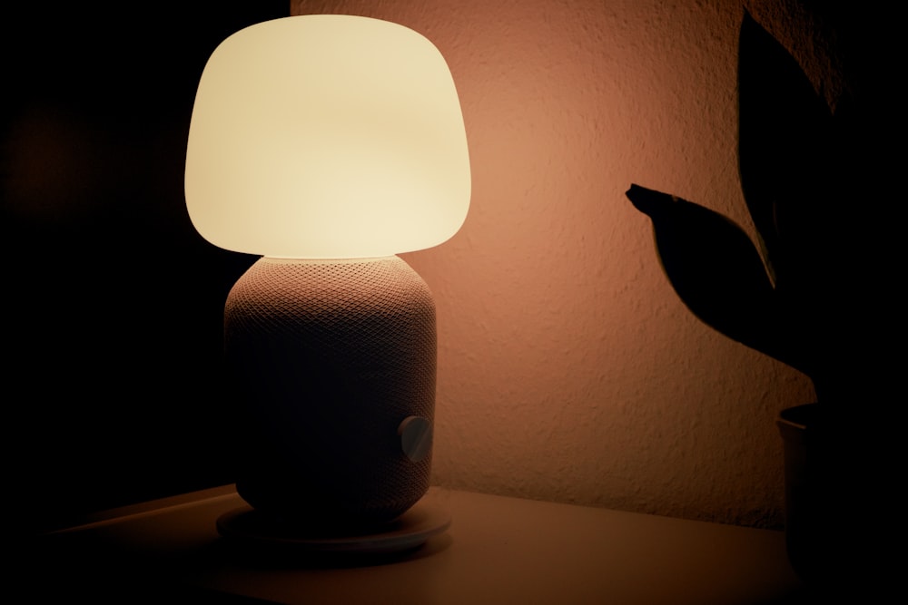 white table lamp on white table