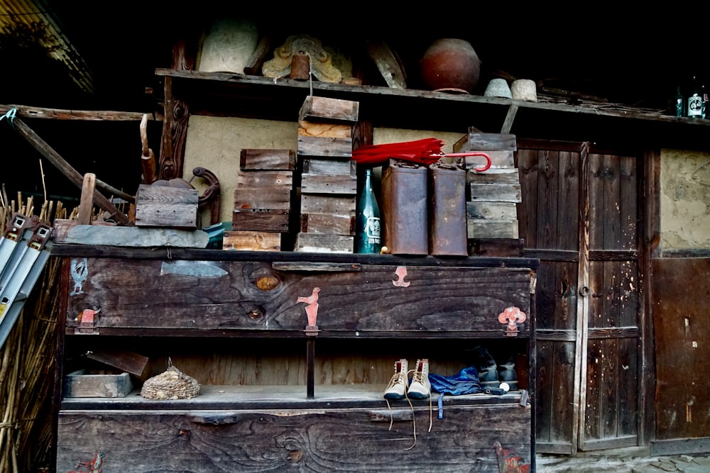 brown wooden shelf with books