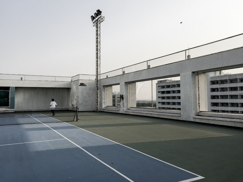 basketball court in front of white building