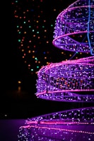 Close-up of vibrant, freshly colored spirals glowing under soft light.