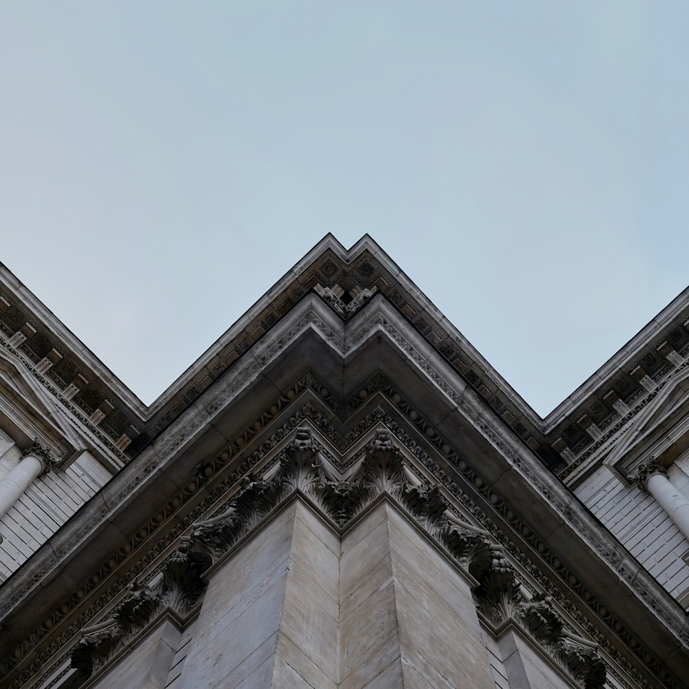 low angle photography of gray concrete building