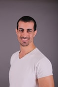 man in white v neck shirt
