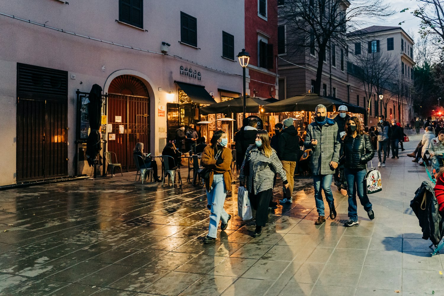 Italian street that shows people cares about fashion and food, peoples walk through the street