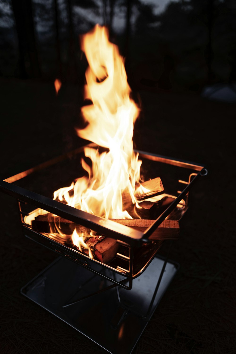 fire on fire pit during night time