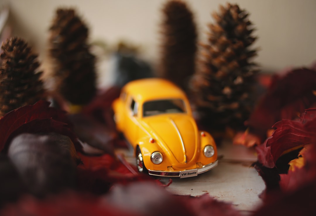 yellow volkswagen beetle scale model