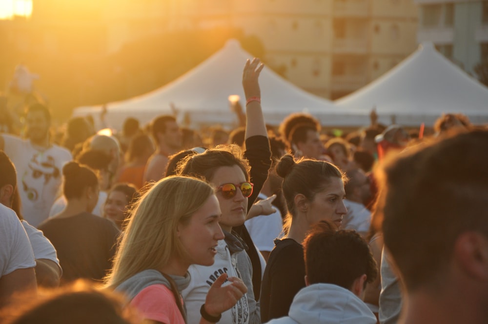 people gathering in a concert during daytime