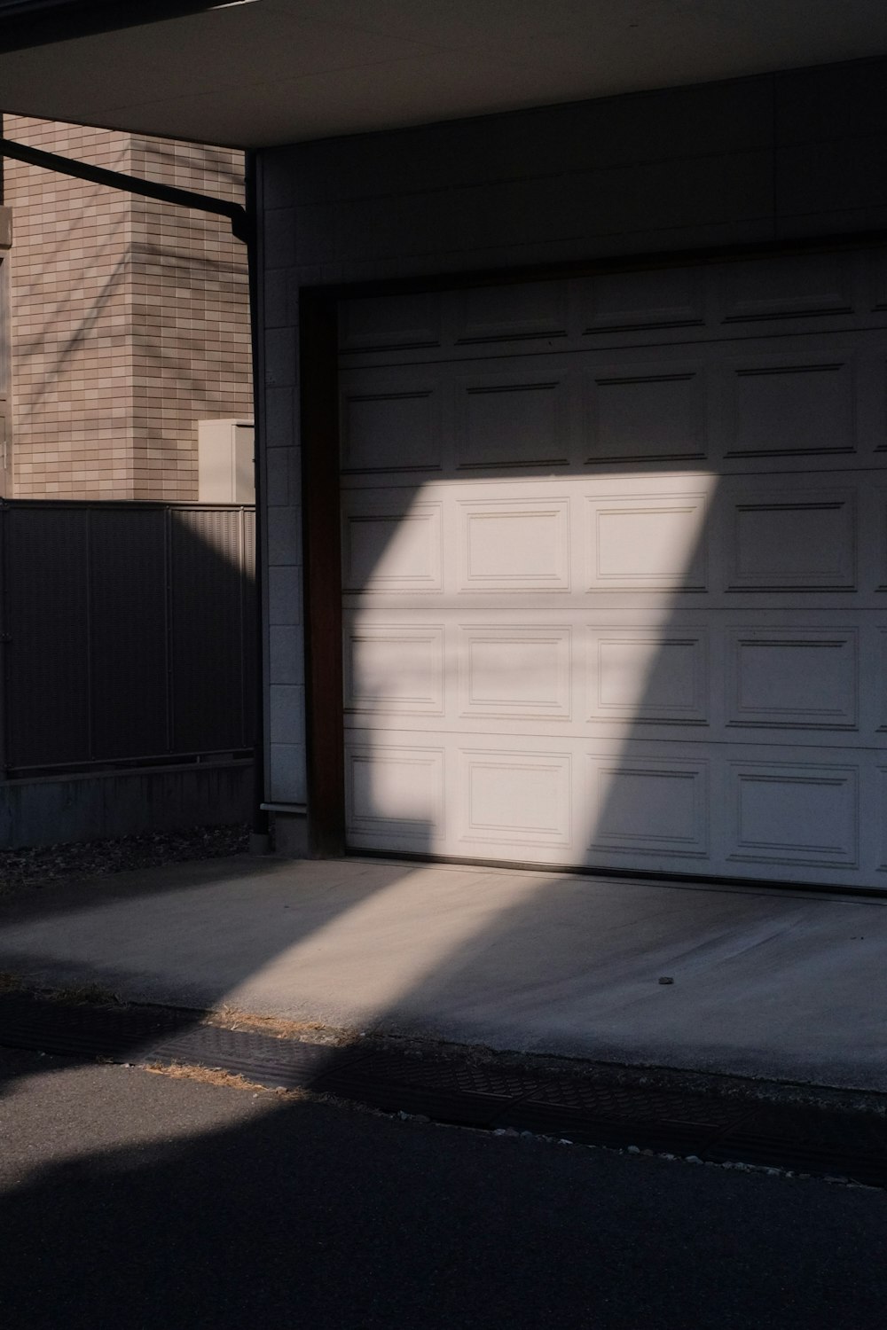 white wooden door near gray concrete floor