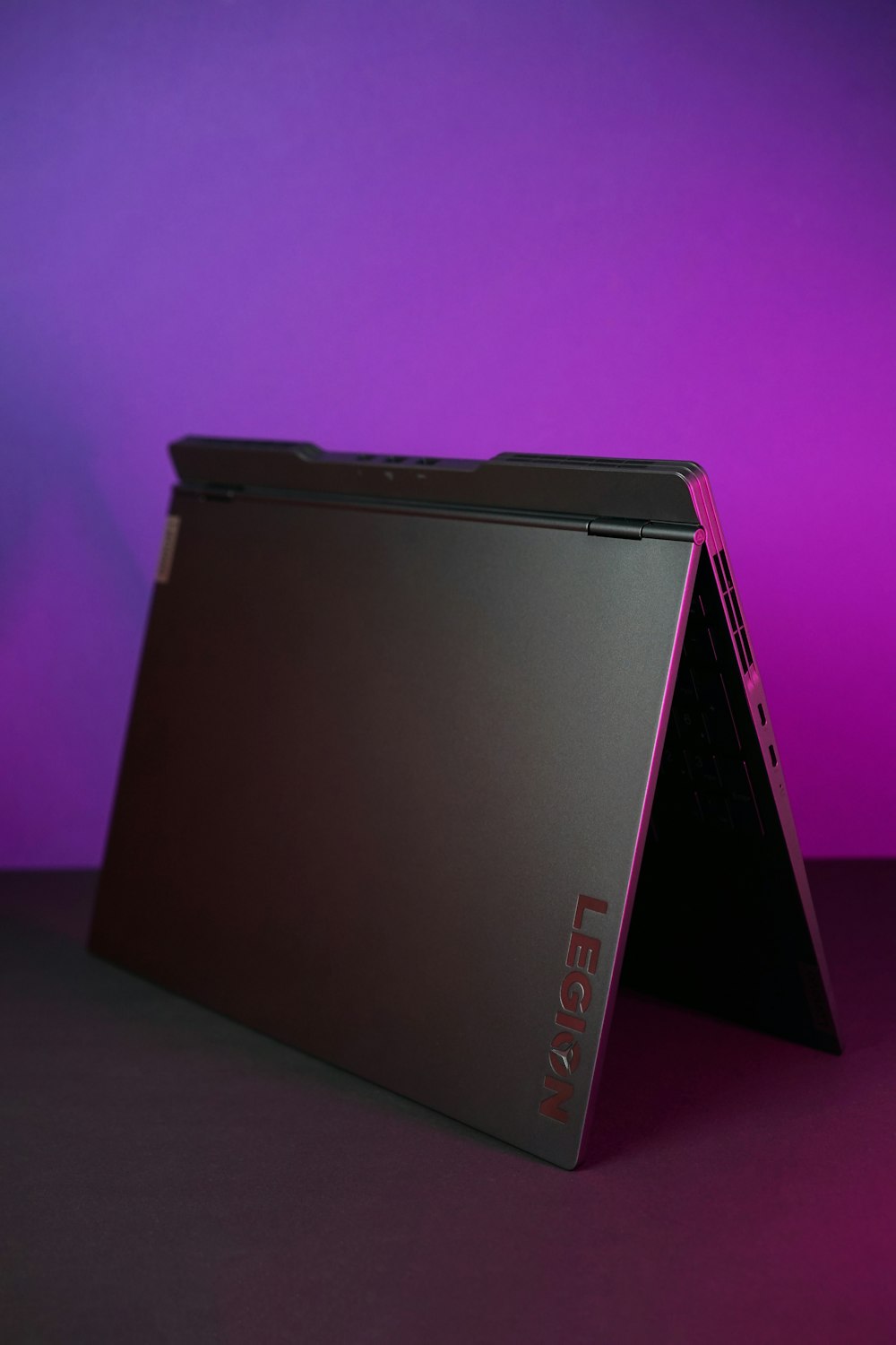 red and black lenovo laptop computer