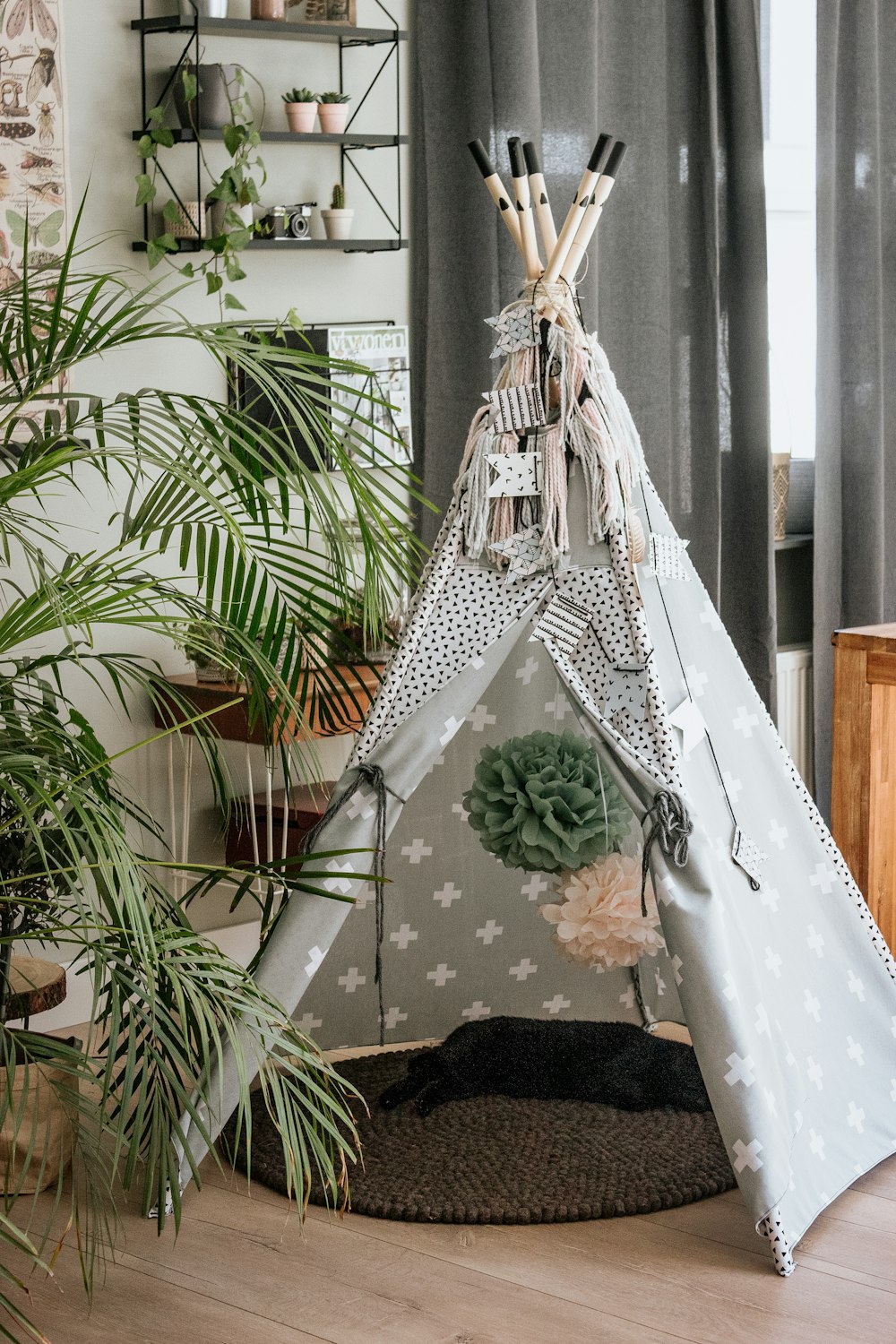 white hammock near green palm plant