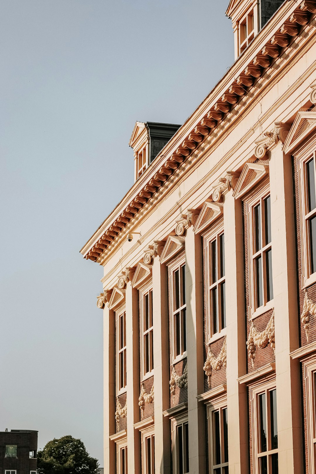 brown concrete building under blue sky during daytime