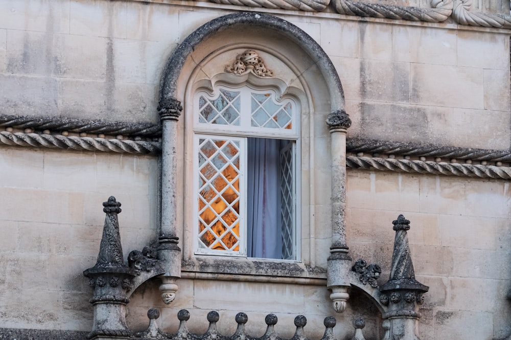 white wooden framed glass window