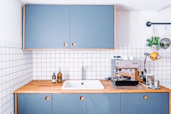 white ceramic sink with faucet