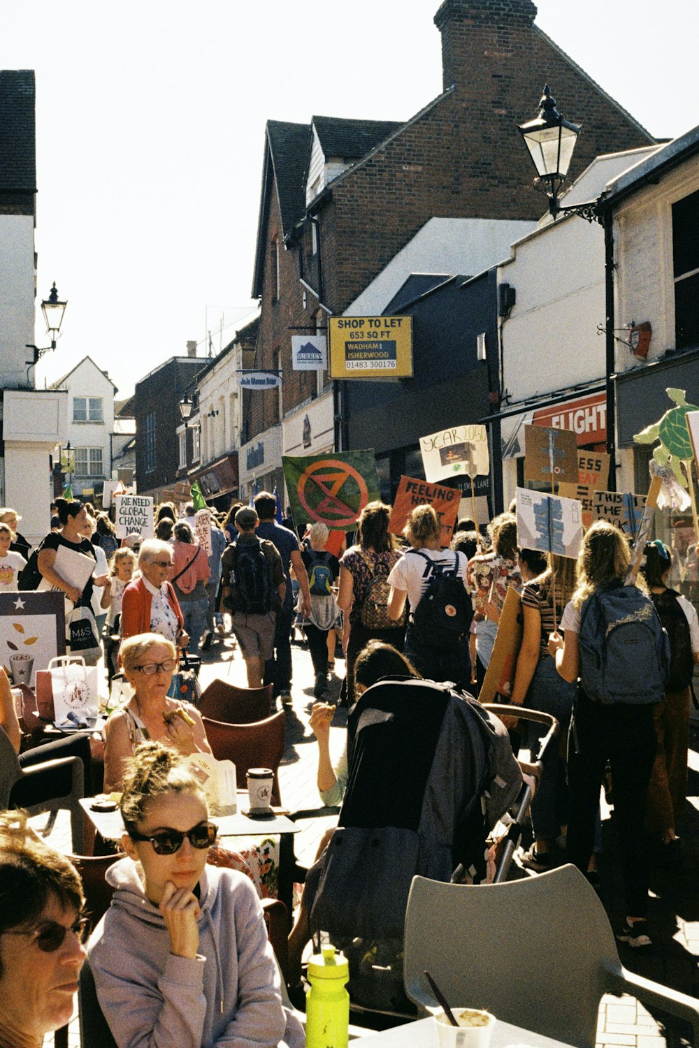 people standing on street during daytime