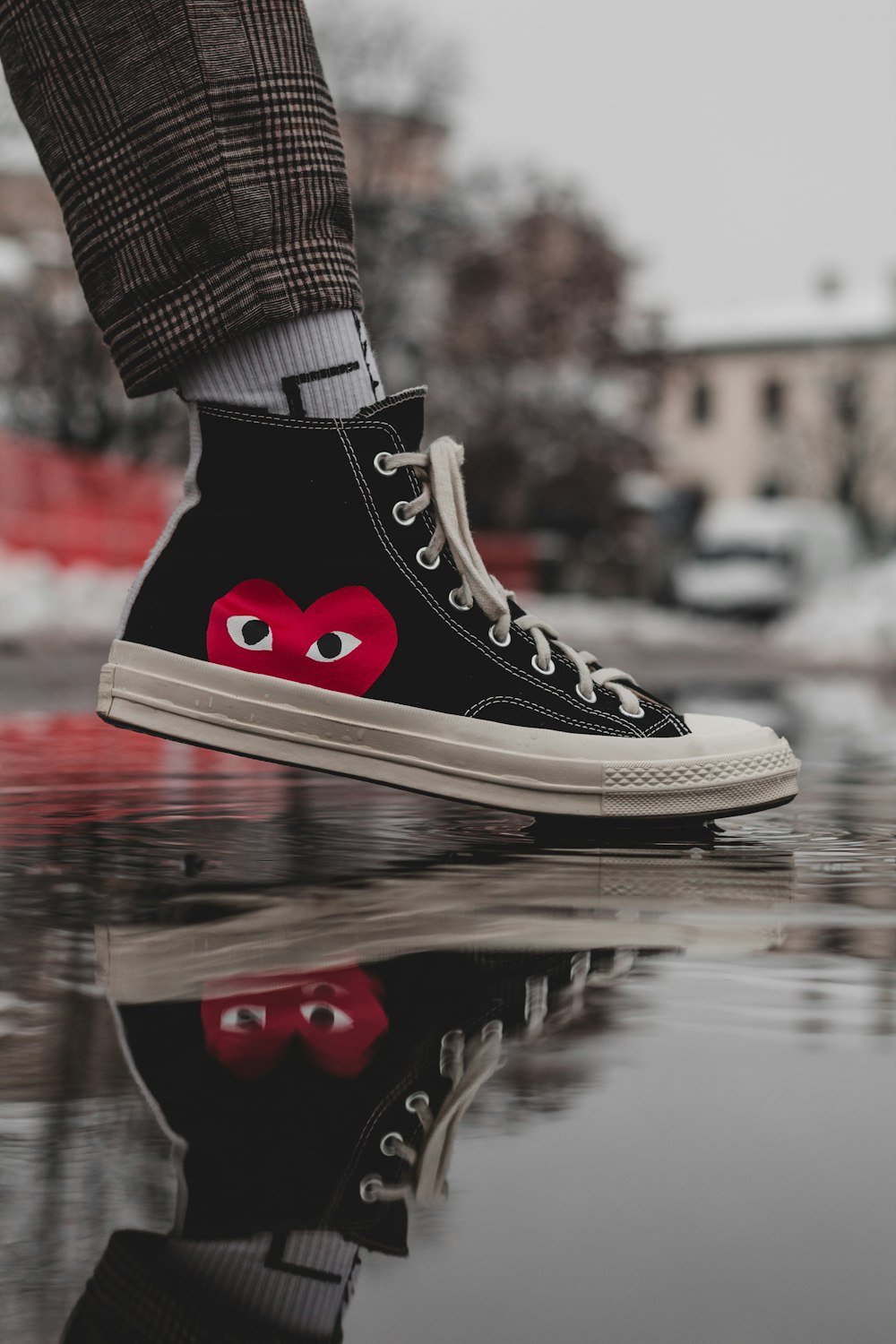 person wearing black and white converse all star high top sneakers photo –  Free Fashion Image on Unsplash