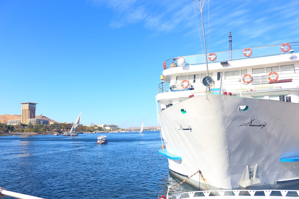 white yacht on sea during daytime