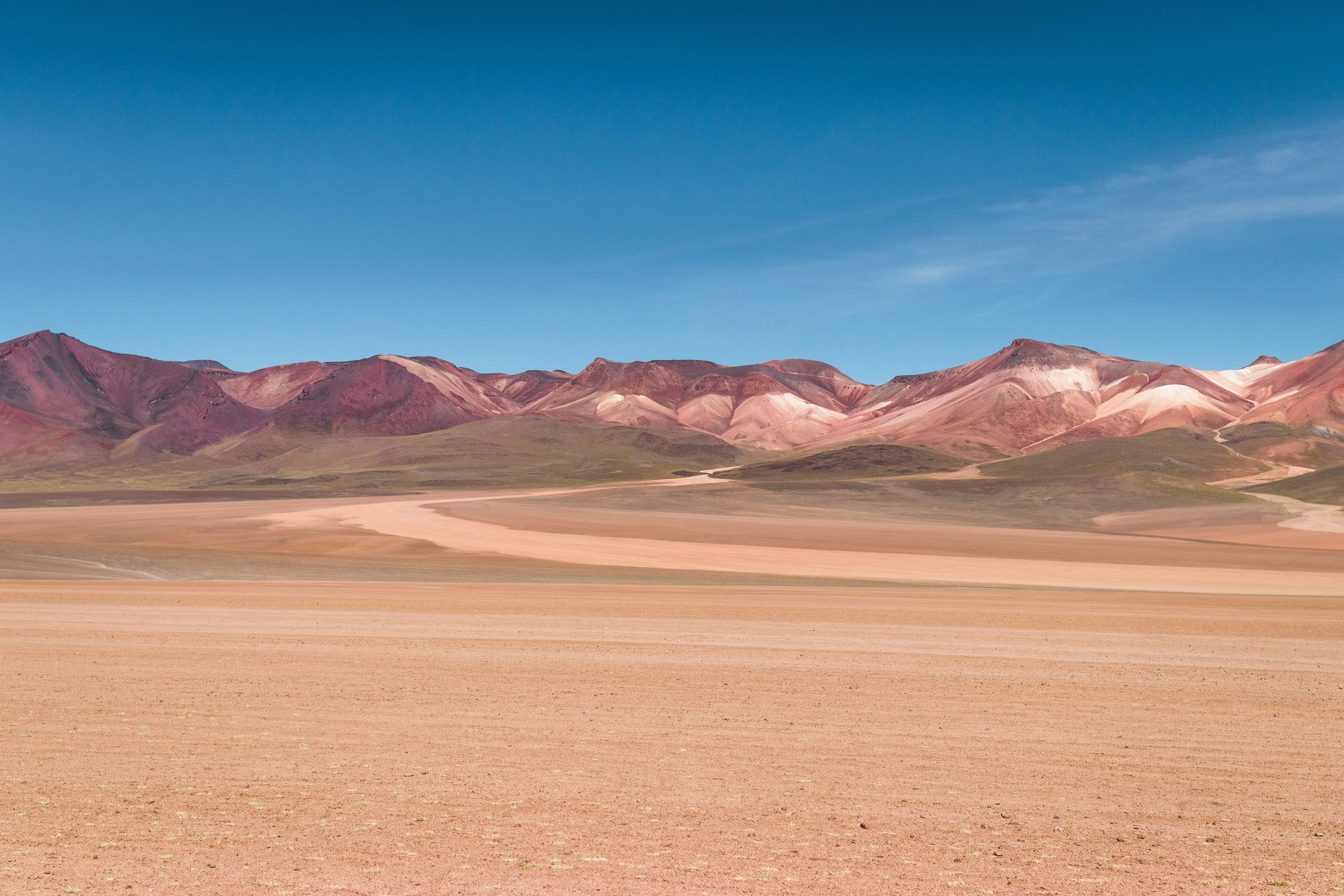 brown and gray mountains under blue sky during daytime