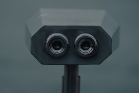 black and silver binoculars in tilt shift lens