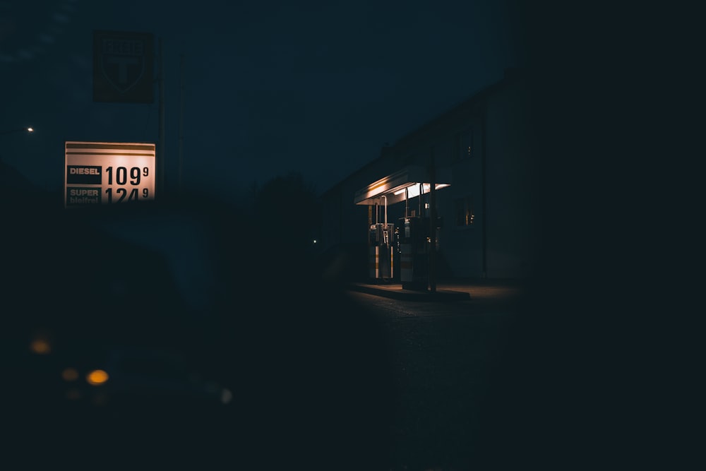 white and blue store signage during night time