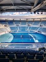 people sitting on stadium during daytime