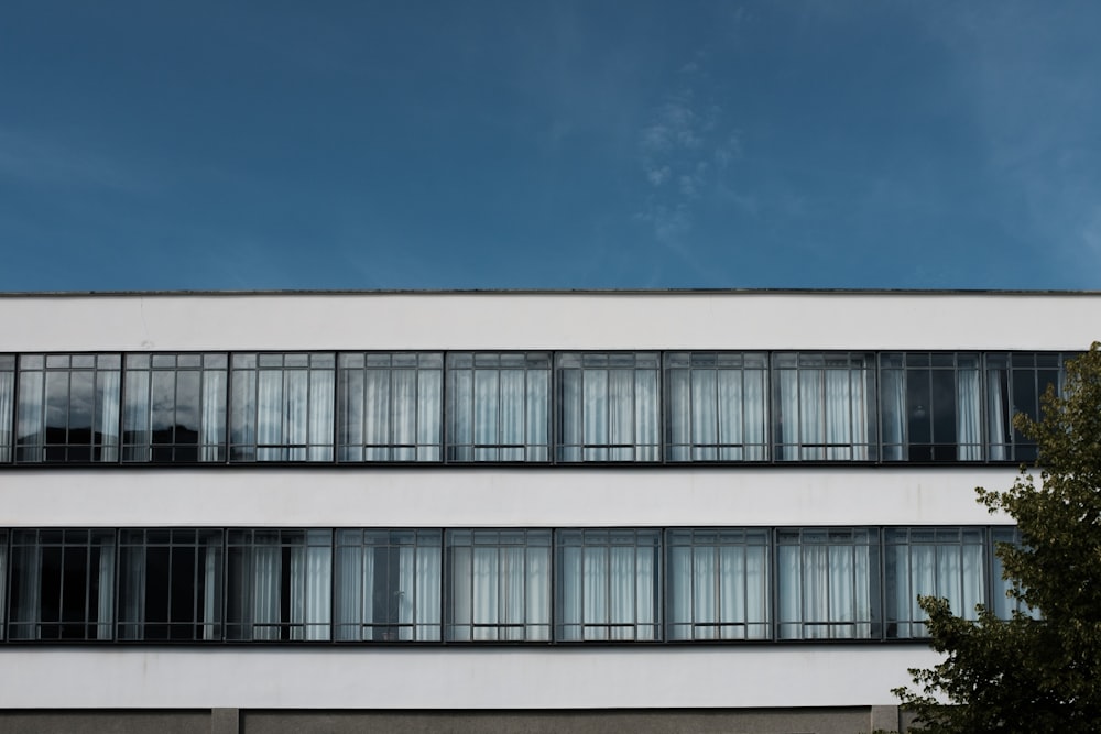 white concrete building under blue sky during daytime