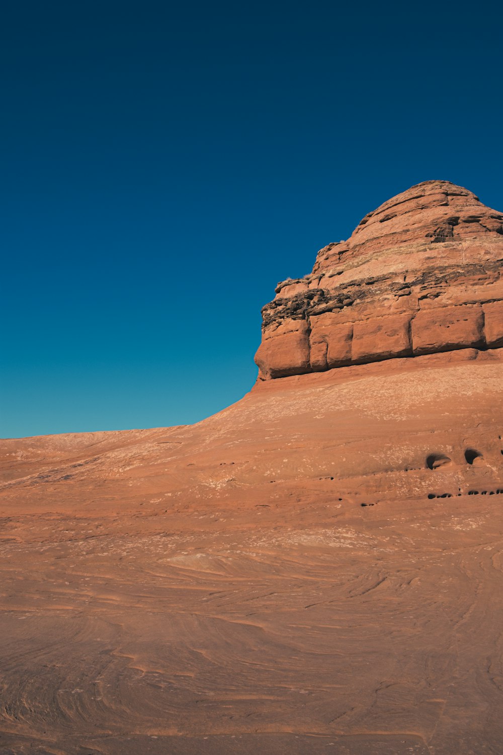 brown rock formation under blue sky during daytime