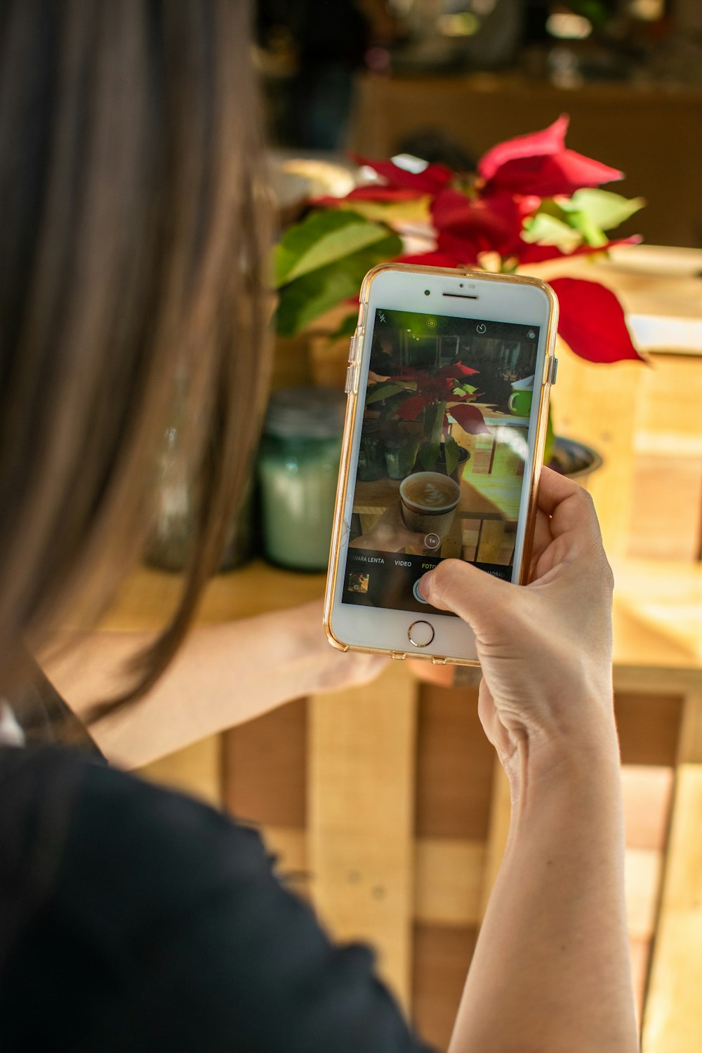 person holding silver iphone 6