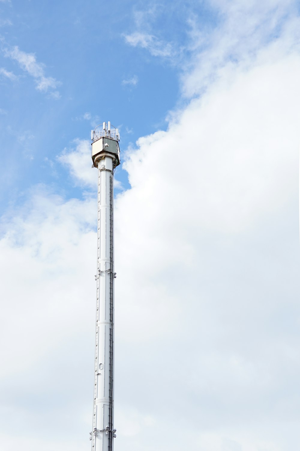 white and gray tower under blue sky during daytime