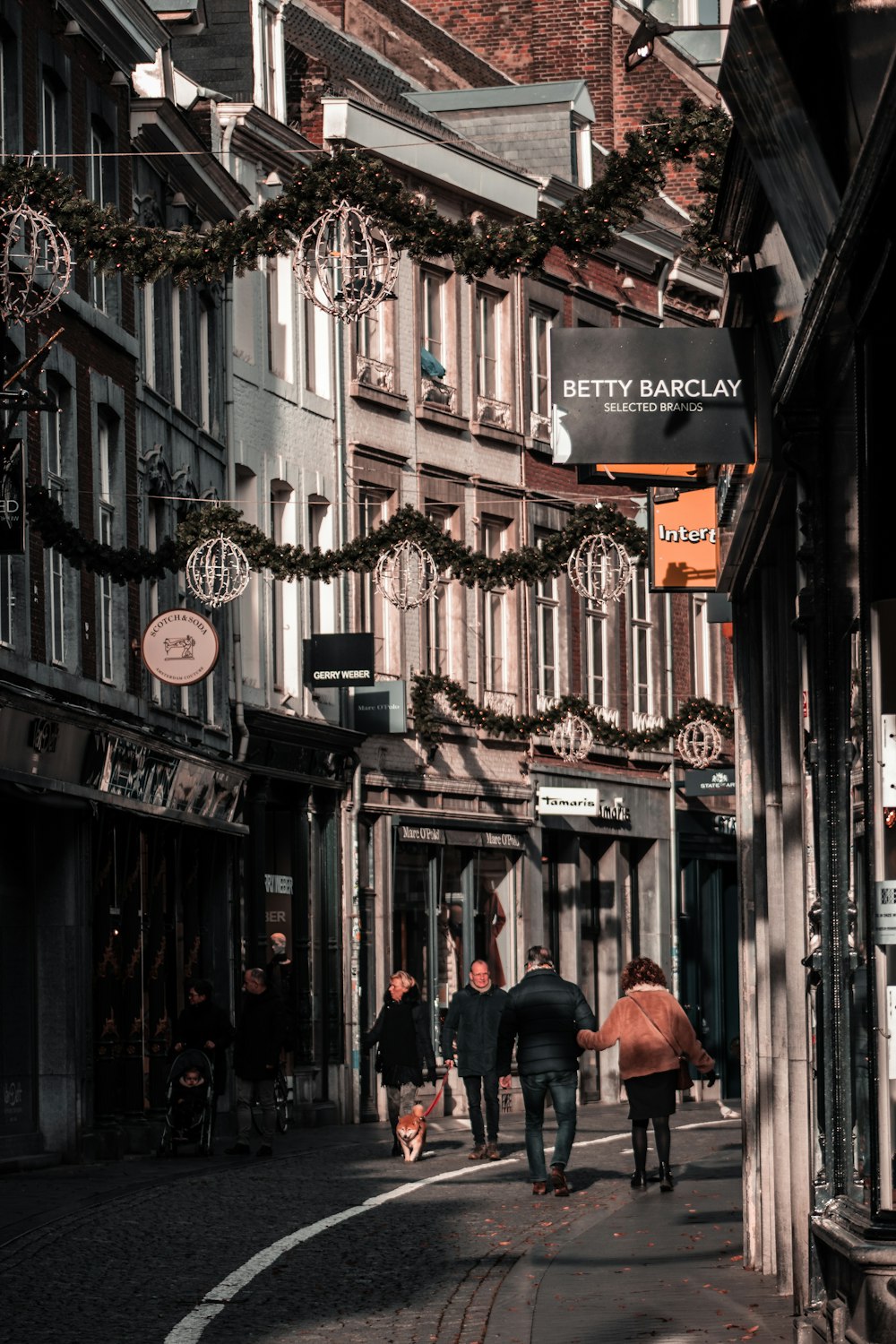 people walking on street during daytime