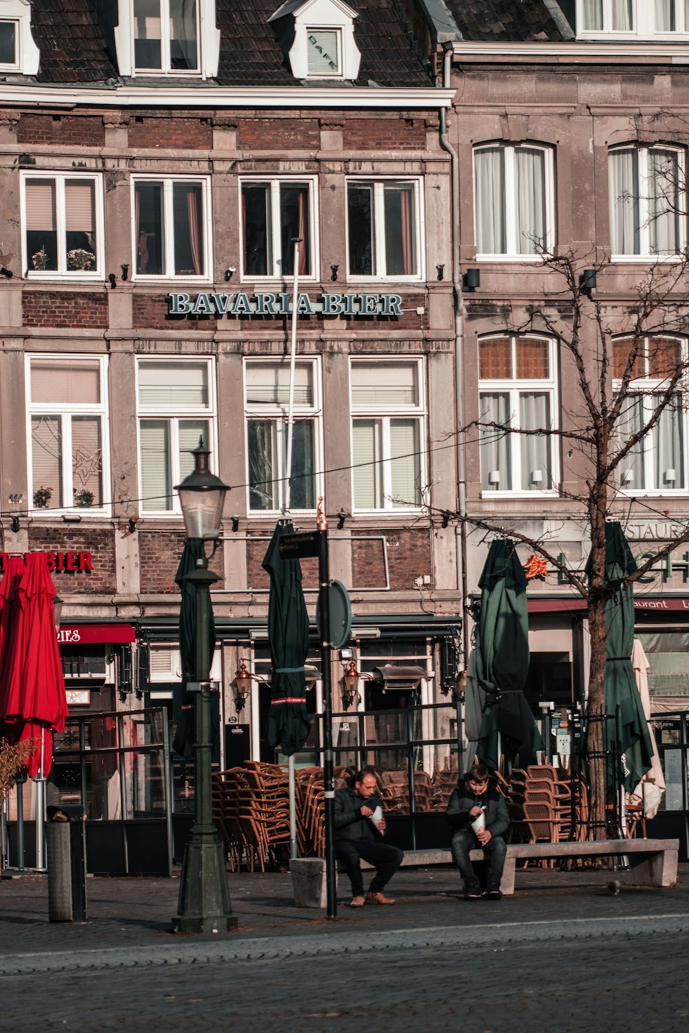 people walking on street near building during daytime