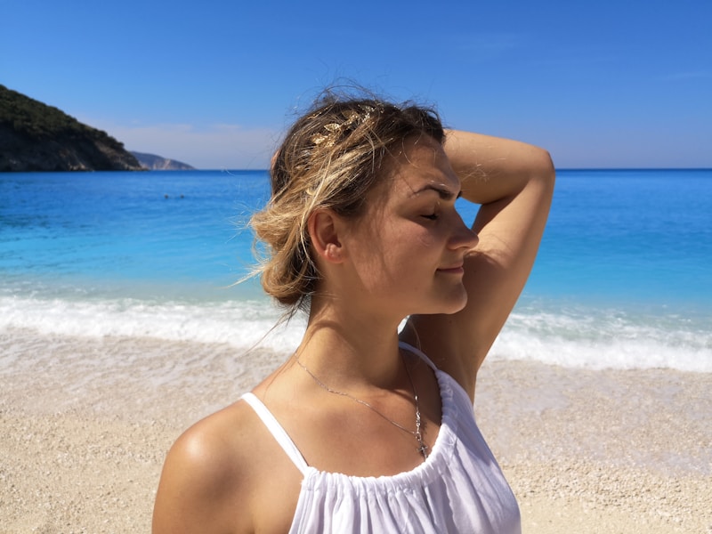 Greek sugar mummy radiating charm on beach