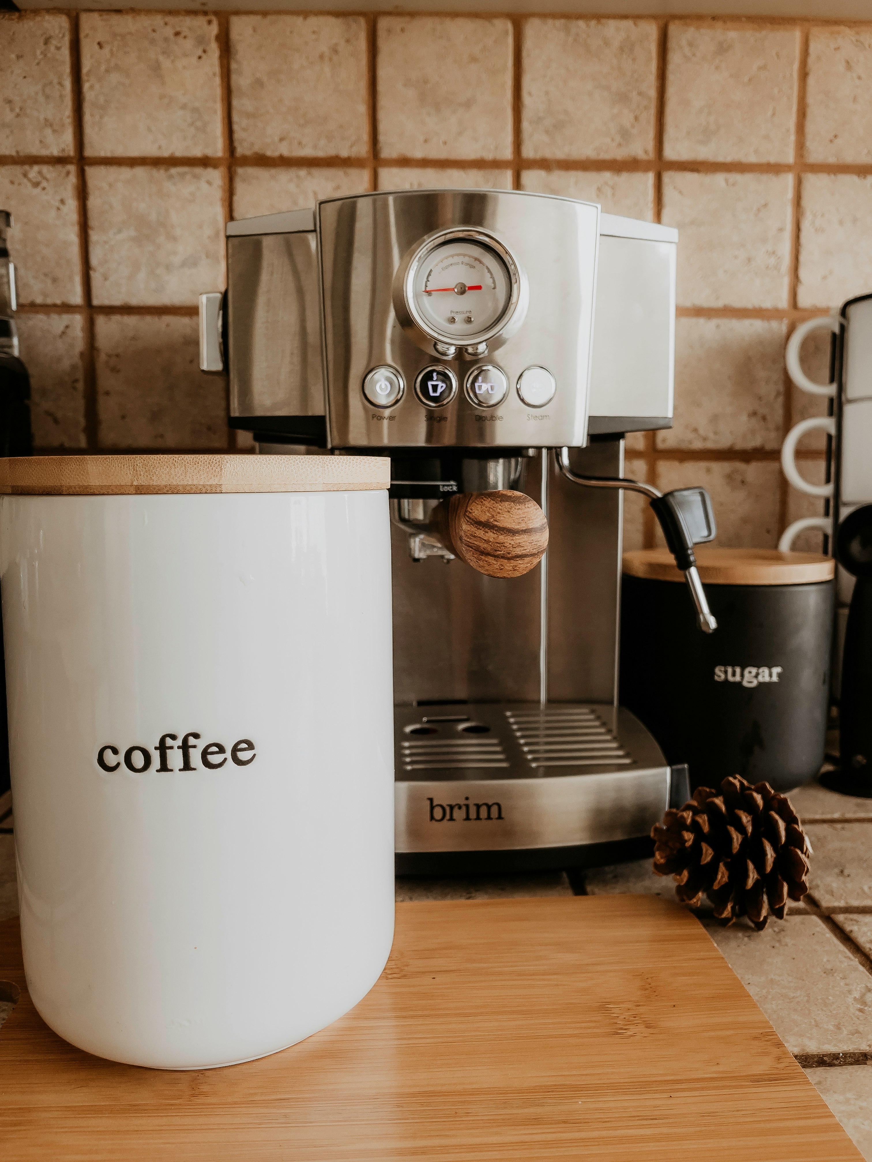 white and black coffee maker