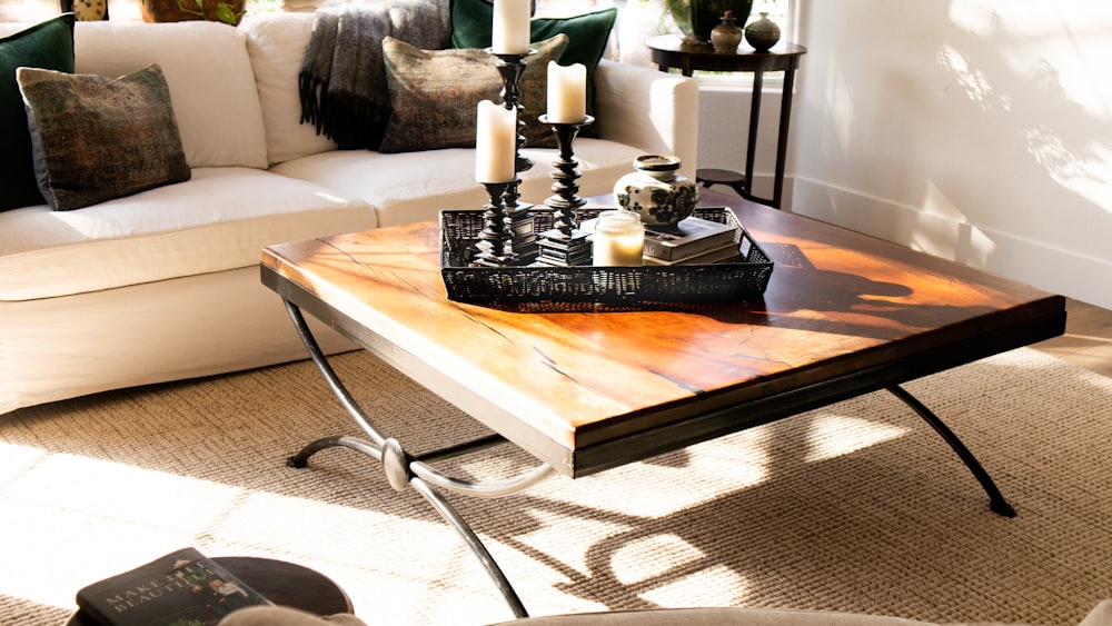 black candle holder on brown wooden table