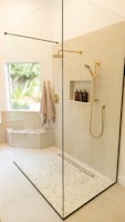 white bathtub with shower curtain