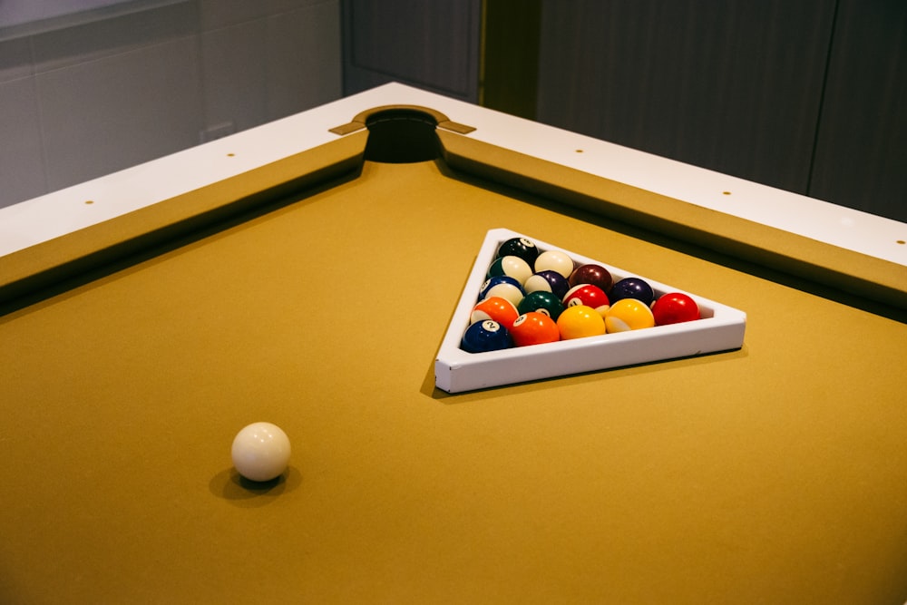 billiard balls on billiard table