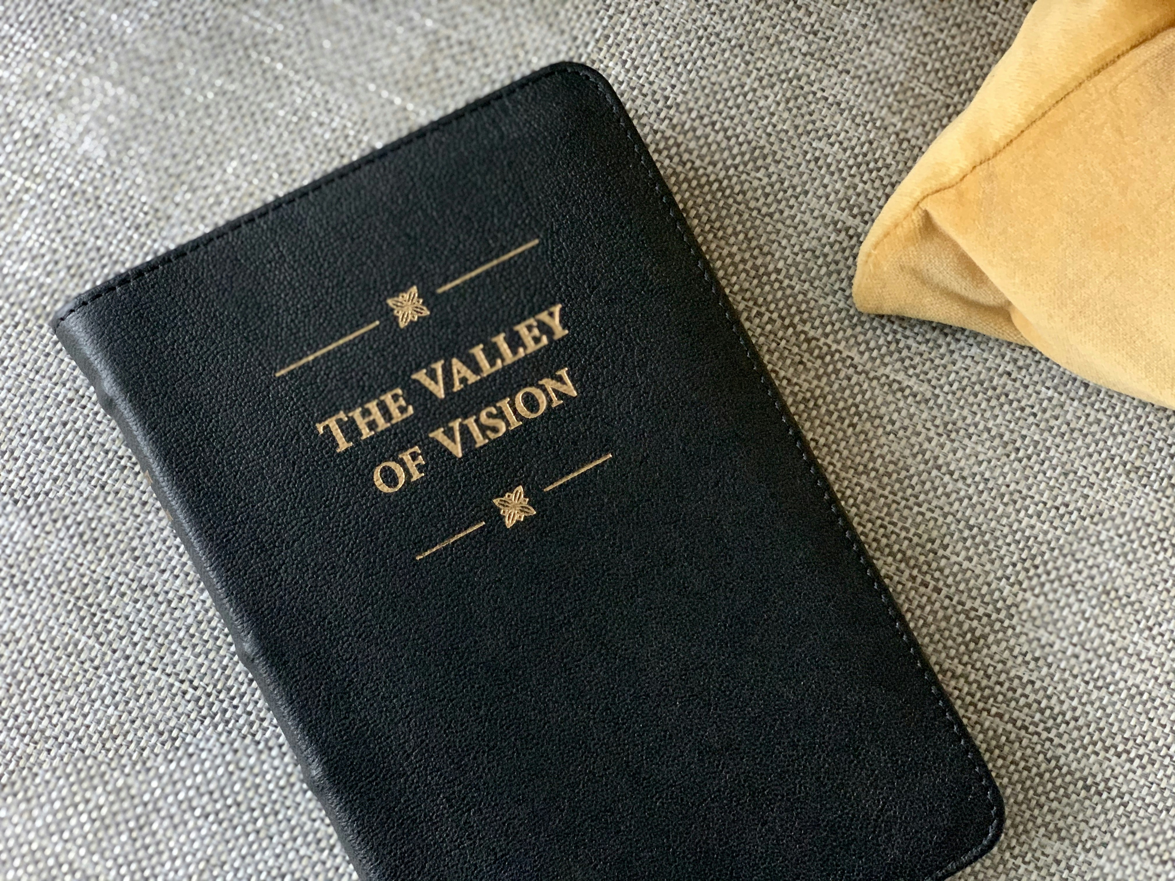 A copy of a Puritan prayer book called The Valley of Vision.