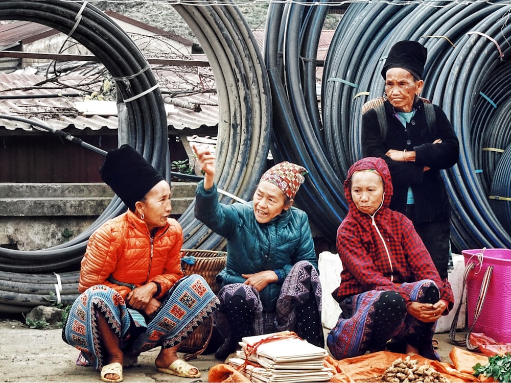 group of people sitting on stairs