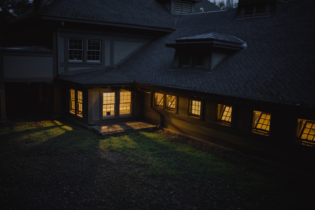 brown and gray house during night time